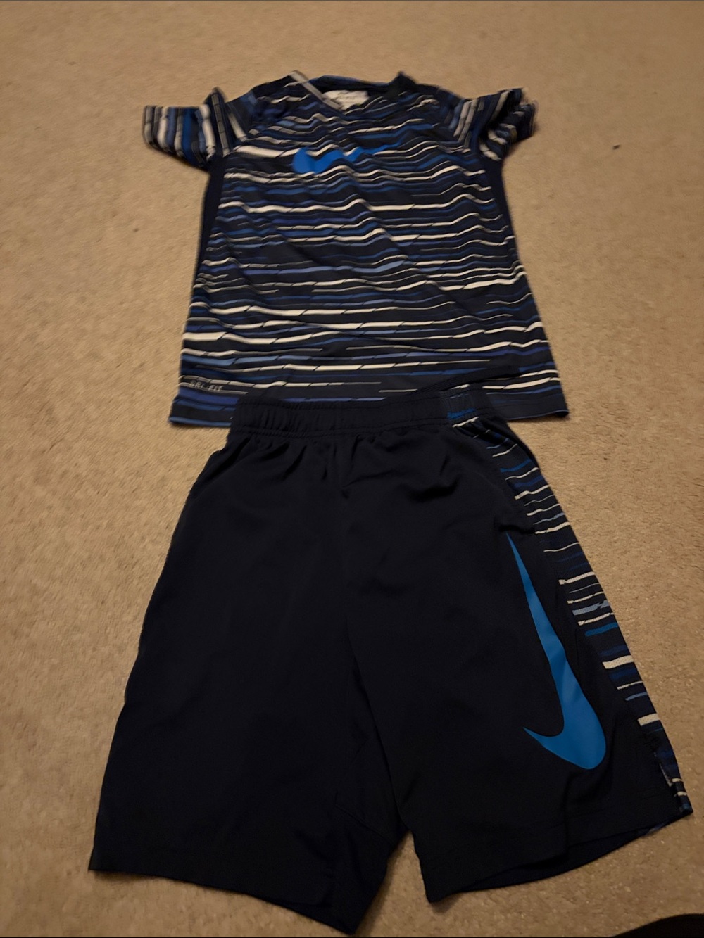 Nike Navy Shorts with Bright Blue Swoosh and Striped Side Panels